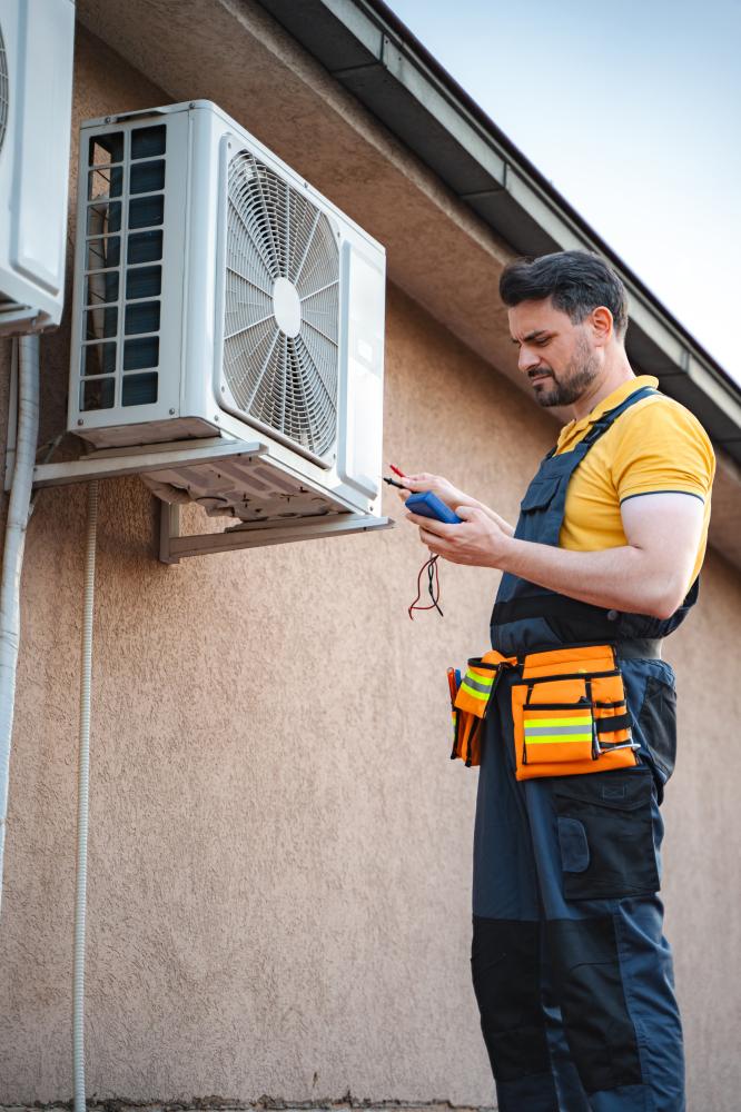 vecteezy electrician is checking an air conditioner with a multimeter 69225585 153